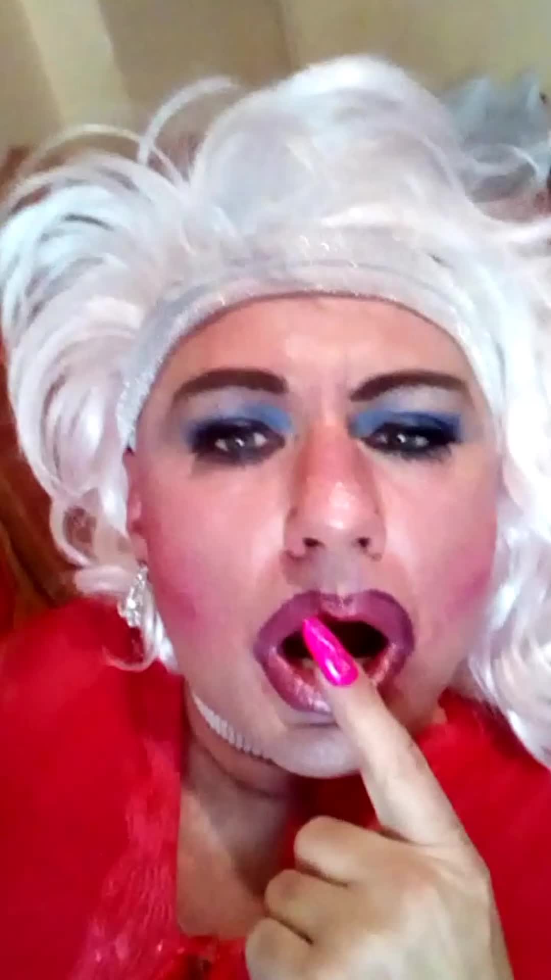 Transvestite showing his small dick